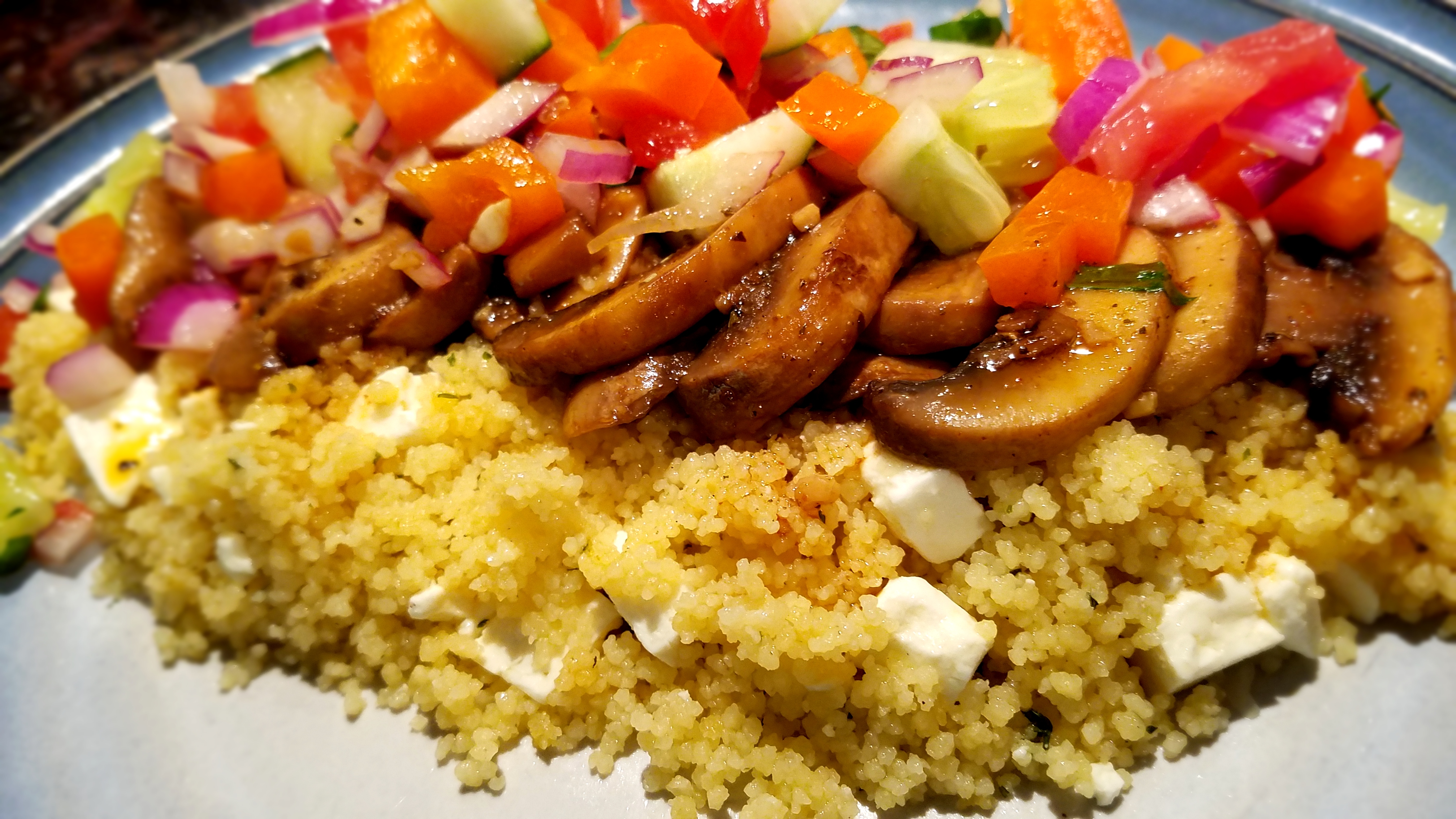 Coriander Sage Mushrooms with Lemon Mint Cucumber Salad over Feta Couscous